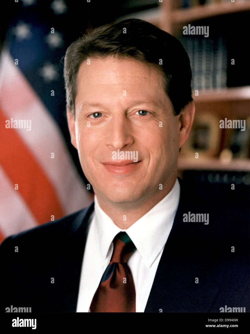 Albert Arnold 'Al' Gore, Jr. (born 1948) served as the 45th Vice-President of the United States 1993-2001 under President Bill Clinton. Head-and-shoulders portrait with stars-and-stripes in background. American Politician Stock Photo