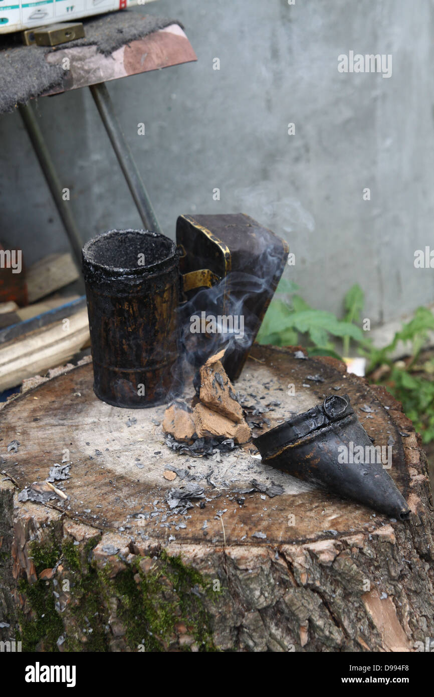 Honeybee smoker Stock Photo
