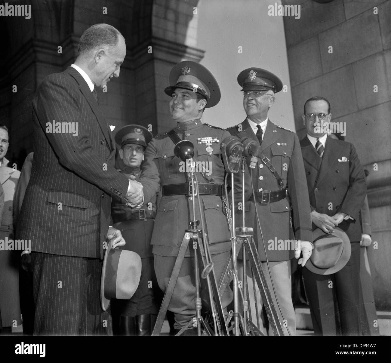 Sumner Welles (1892-1961) US Under-Secretary of State with Cuban leader Fulgencio Batista as General Malin Craig, American Army Chief of Staff, looks on, 1938. Stock Photo