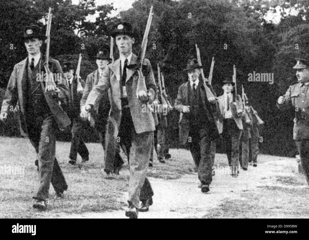 With invasion by Germany threatening, the Local Defence Volunteers was created in Britain in May 1940. Known as the Home Guard, they were men from 17 to 65. Home Guard members training. Stock Photo