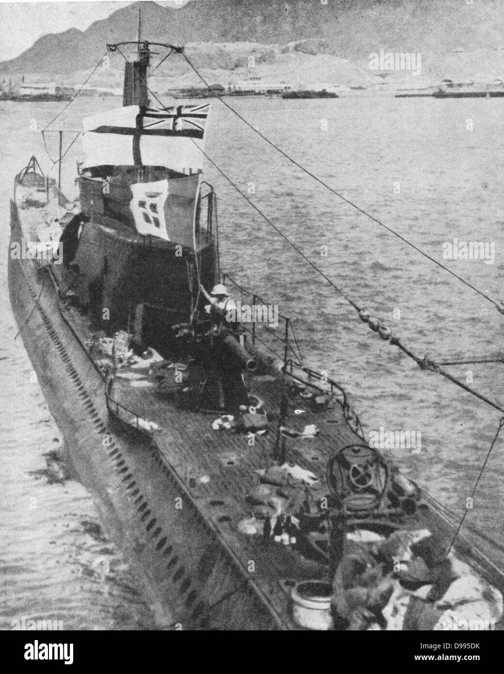 Italian submarine 'Galileo Galilei' flying the White Ensign after capture off Aden by the British Admiralty trawler 'Moonstone' on 19 June 1940. Depth charges forced submarine to the surface and crew was forced to surrender. Stock Photo
