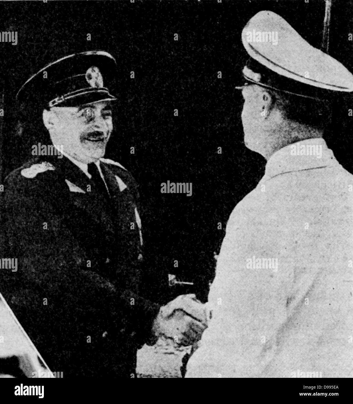Ion Gigurti, Romanian Prime Minister, left, welcomed to Munich by Joachim von Ribbentrop, German Foreign Minister. Stock Photo