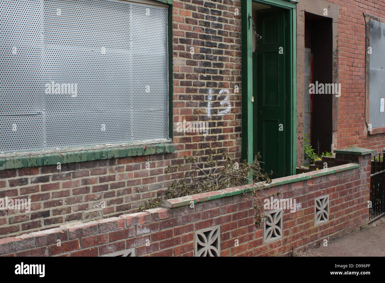 Derelict Houses, Securely boarded up Stock Photo - Alamy