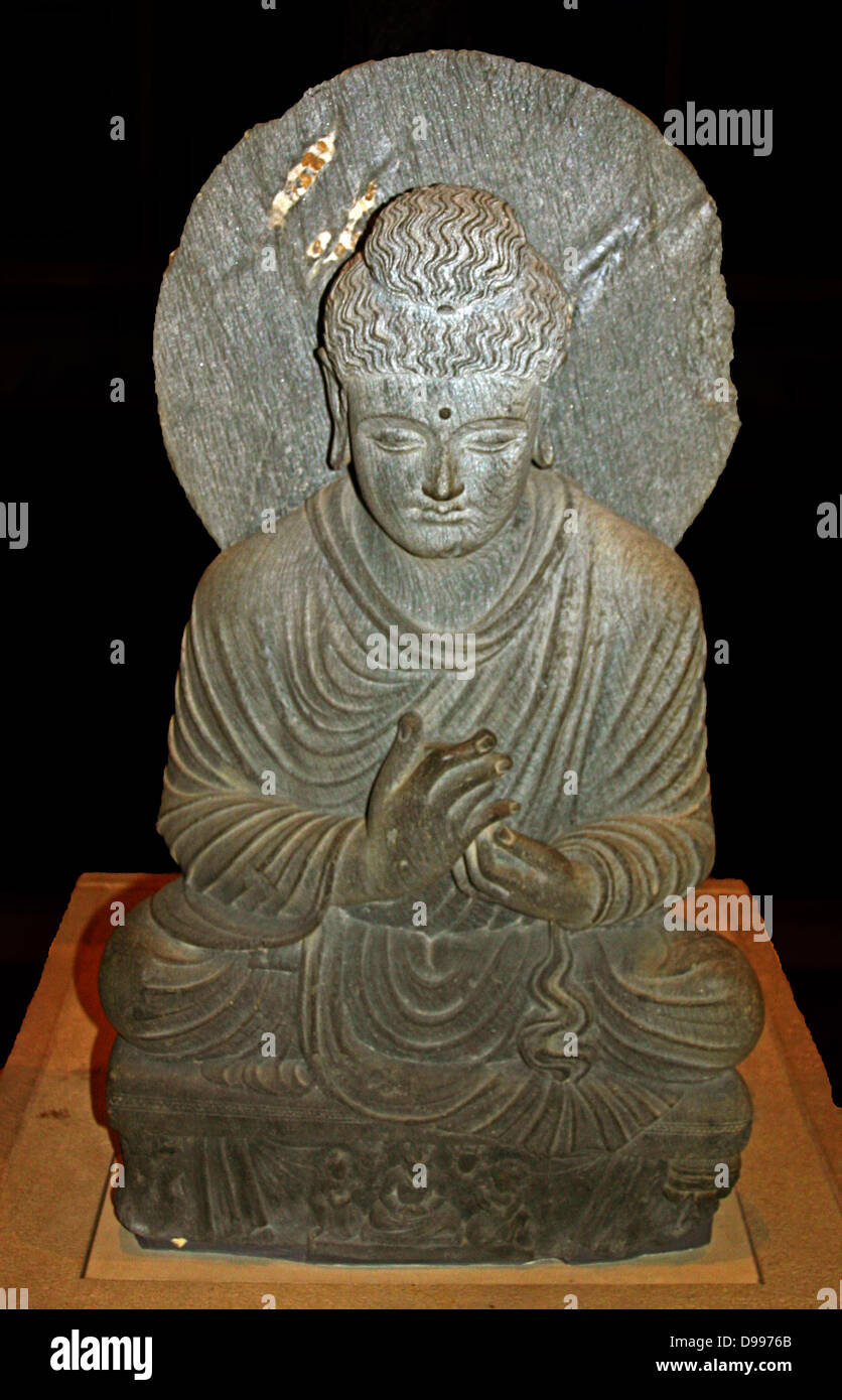 Seated Buddha from Gandhara, shows him as a teacher. Pakistan, about 2nd - 3rd century AD Stock Photo