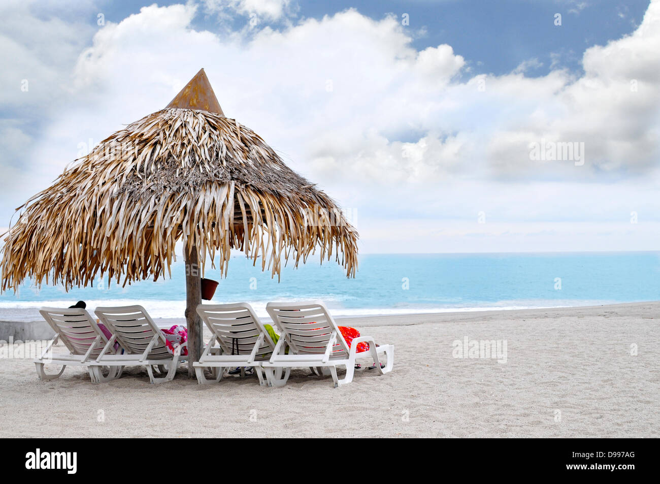 Beach hut with chairs looking at the ocean Stock Photo Alamy