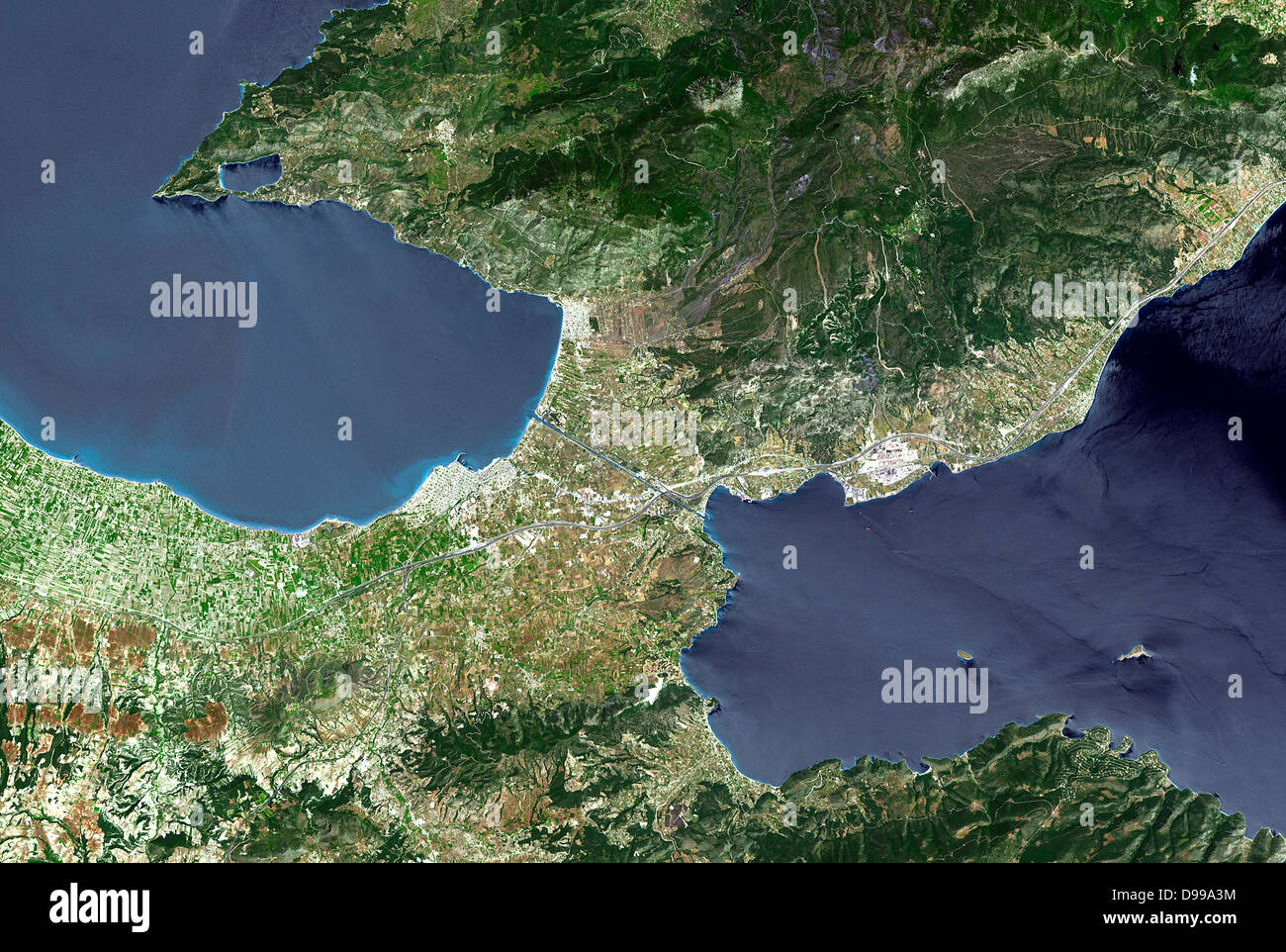 The Isthmus of Corinth is the only land bridge between the country's north (Attica) and south (Peloponnese). Greece. Satellite. May 9, 2005 Stock Photo