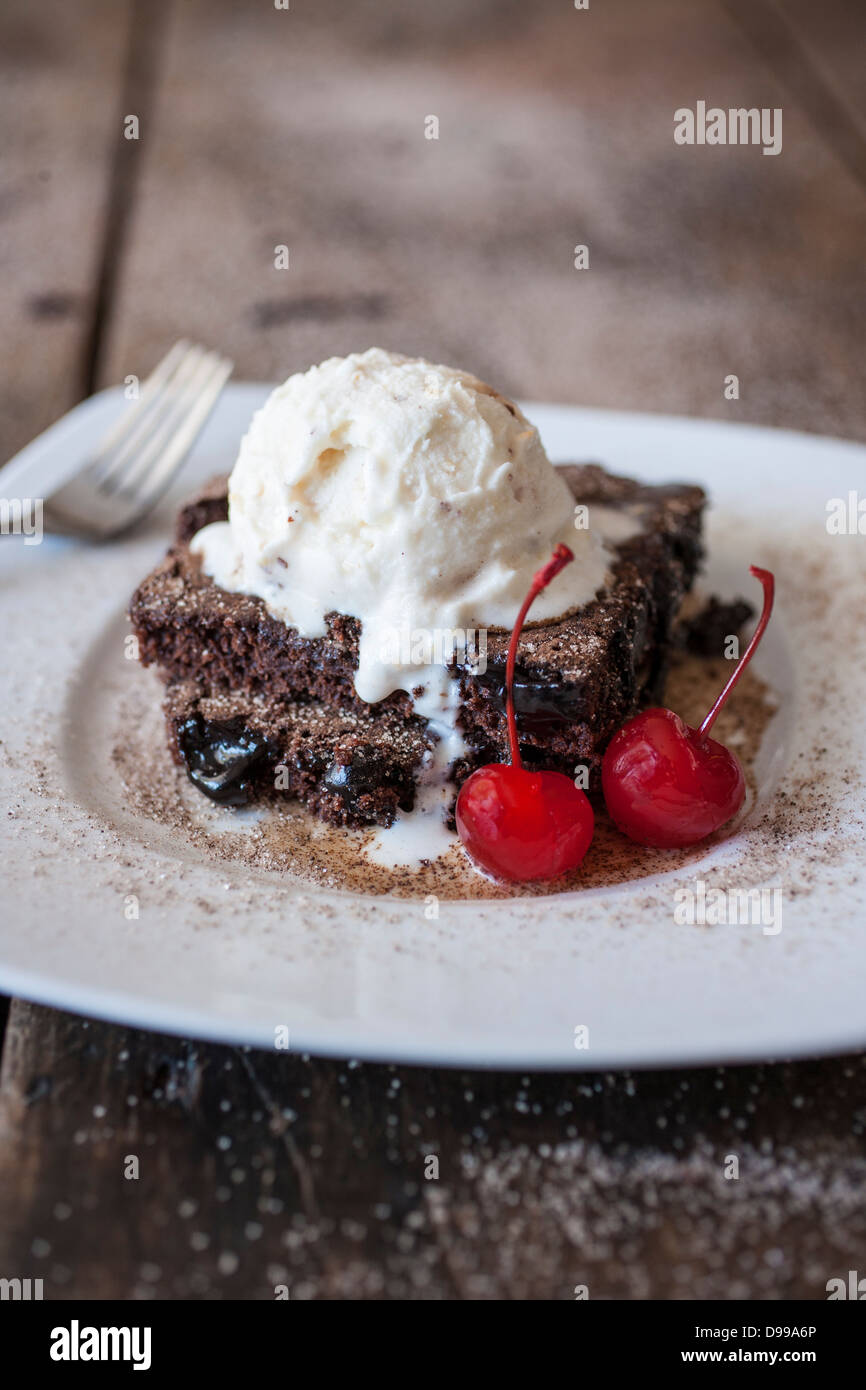 fudge brownie ala mode' with cherries Stock Photo