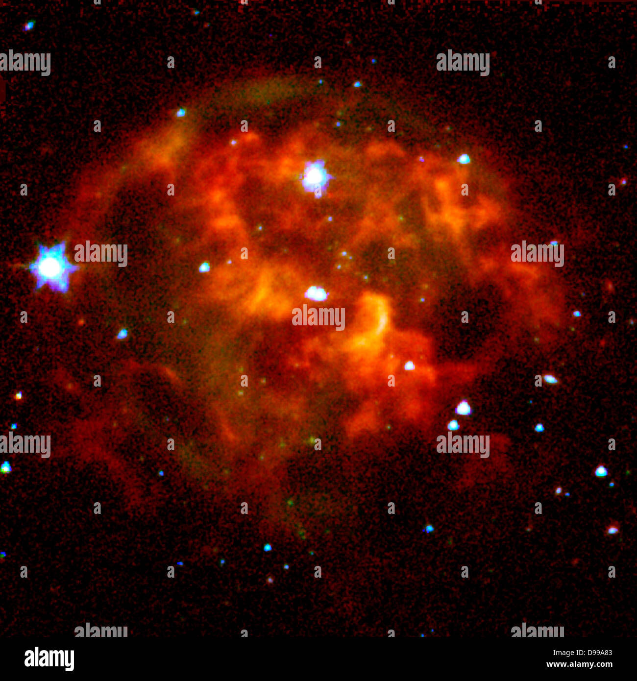 A dying star (center) surrounded by a cloud of glowing gas and dust