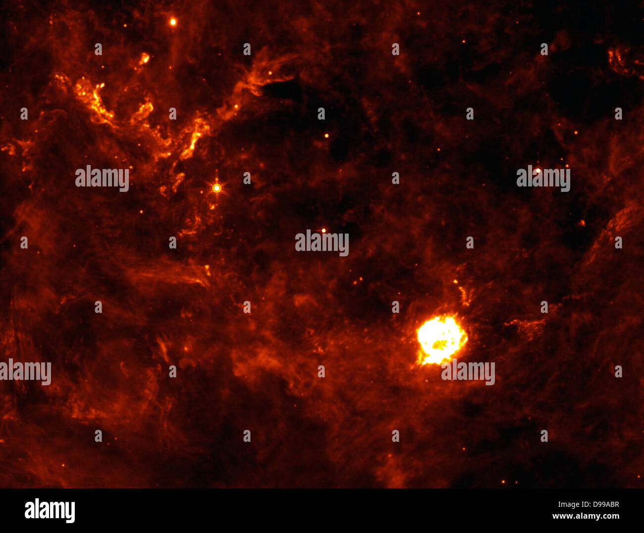 The Cassiopeia A supernova's first flash of radiation makes six clumps of dust (circled in annotated version) unusually hot. The supernova remnant is the large white ball in the center. This infrared picture was taken by NASA's Spitzer Space Telescope. Stock Photo