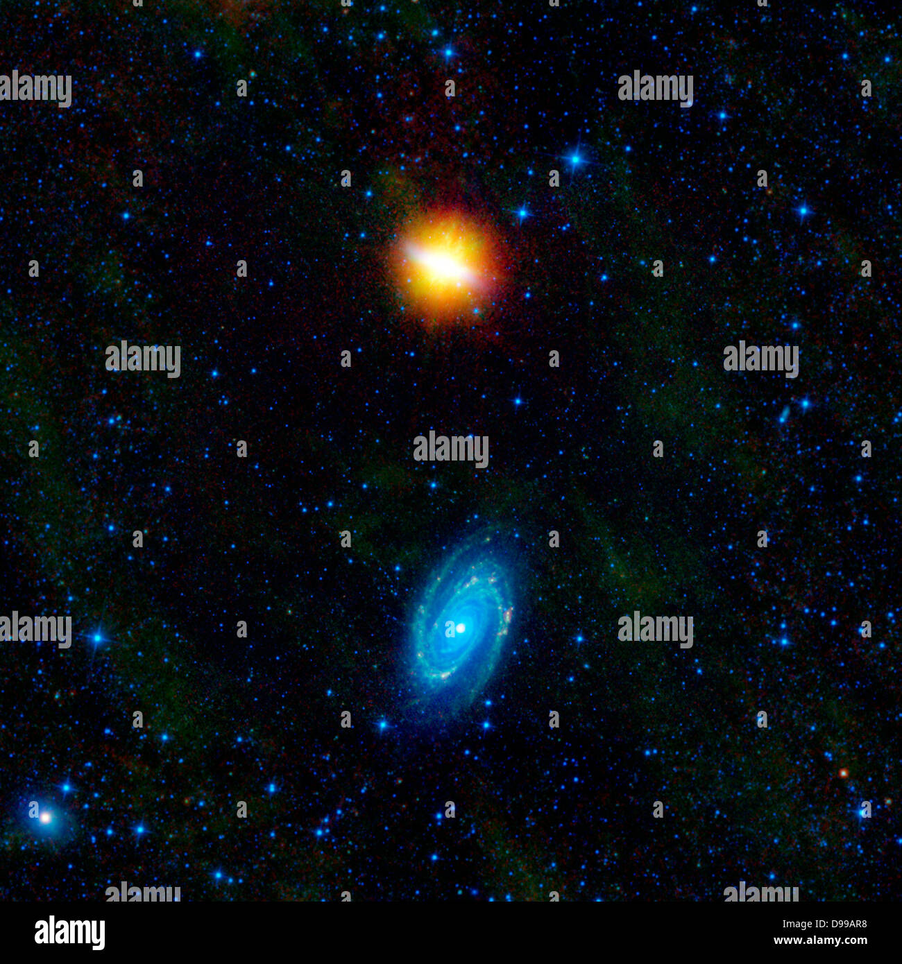 This image from NASA's WISE, features two stunning galaxies engaged in an intergalactic dance. The galaxies, Messier 81 and Messier 82, swept by each other a few hundred million years ago, and will likely continue to twirl around each other multiple times before eventually merging into a single galaxy. Stock Photo