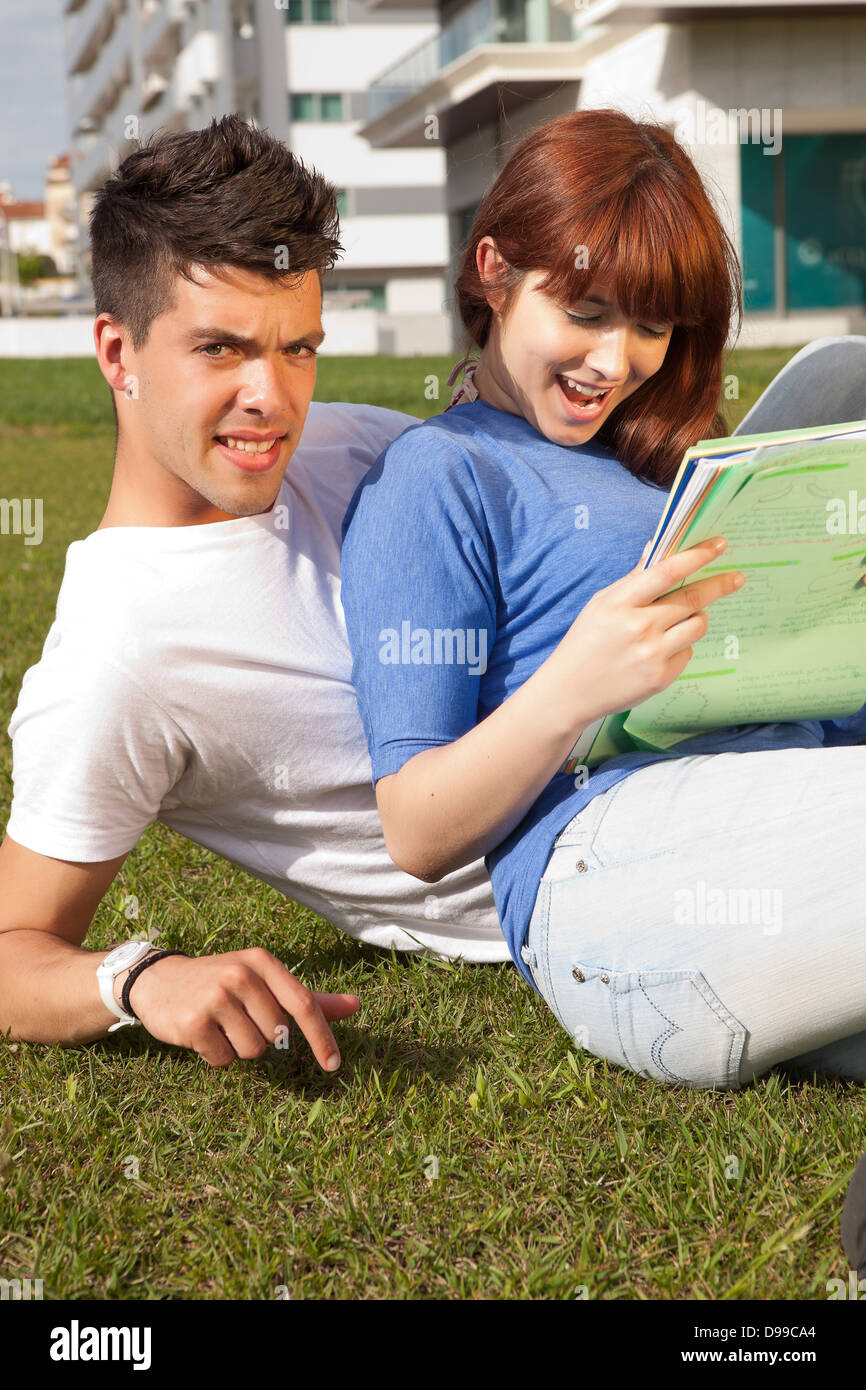 Young happy couple at the park Stock Photo - Alamy