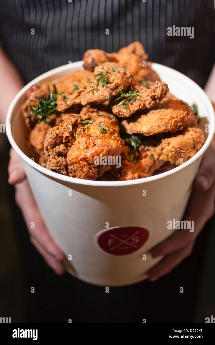 bucket of golden fried chicken Stock Photo