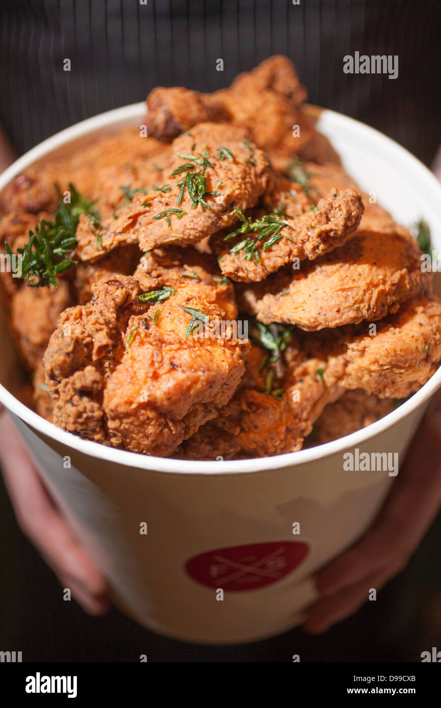 bucket of golden fried chicken Stock Photo