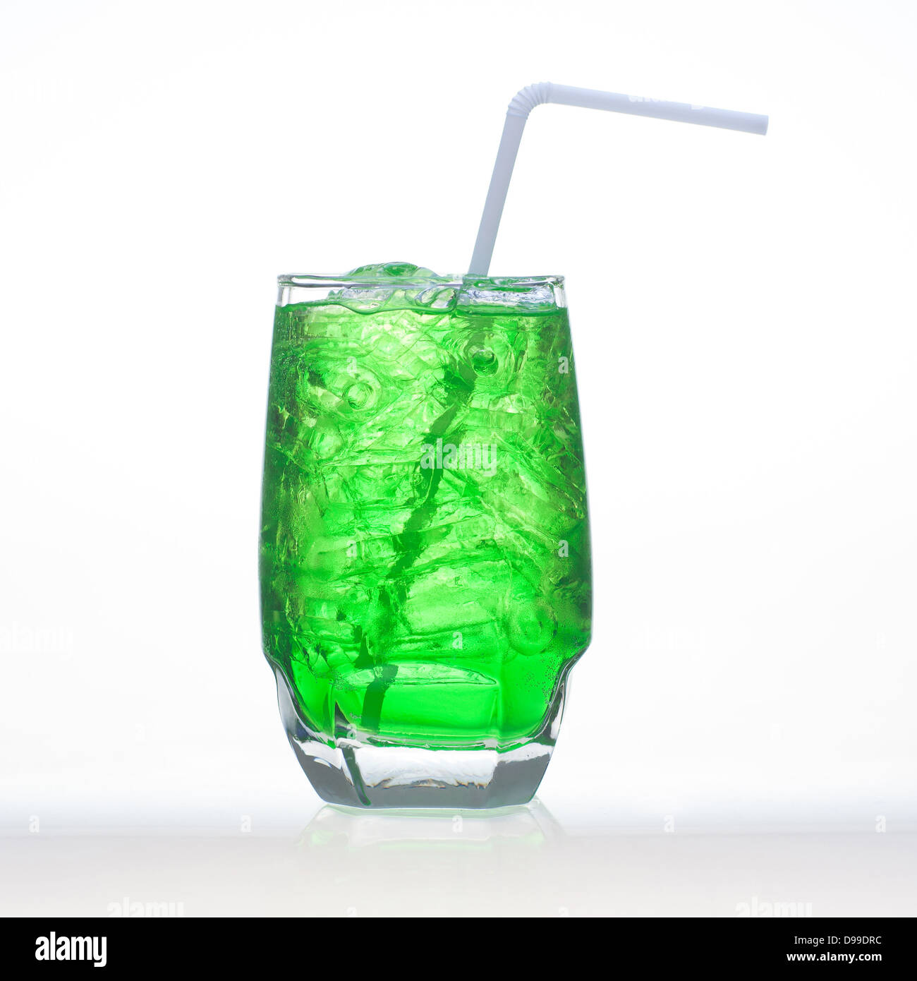 Green fruit flavor soft drinks whit soda water isolated on white Stock Photo