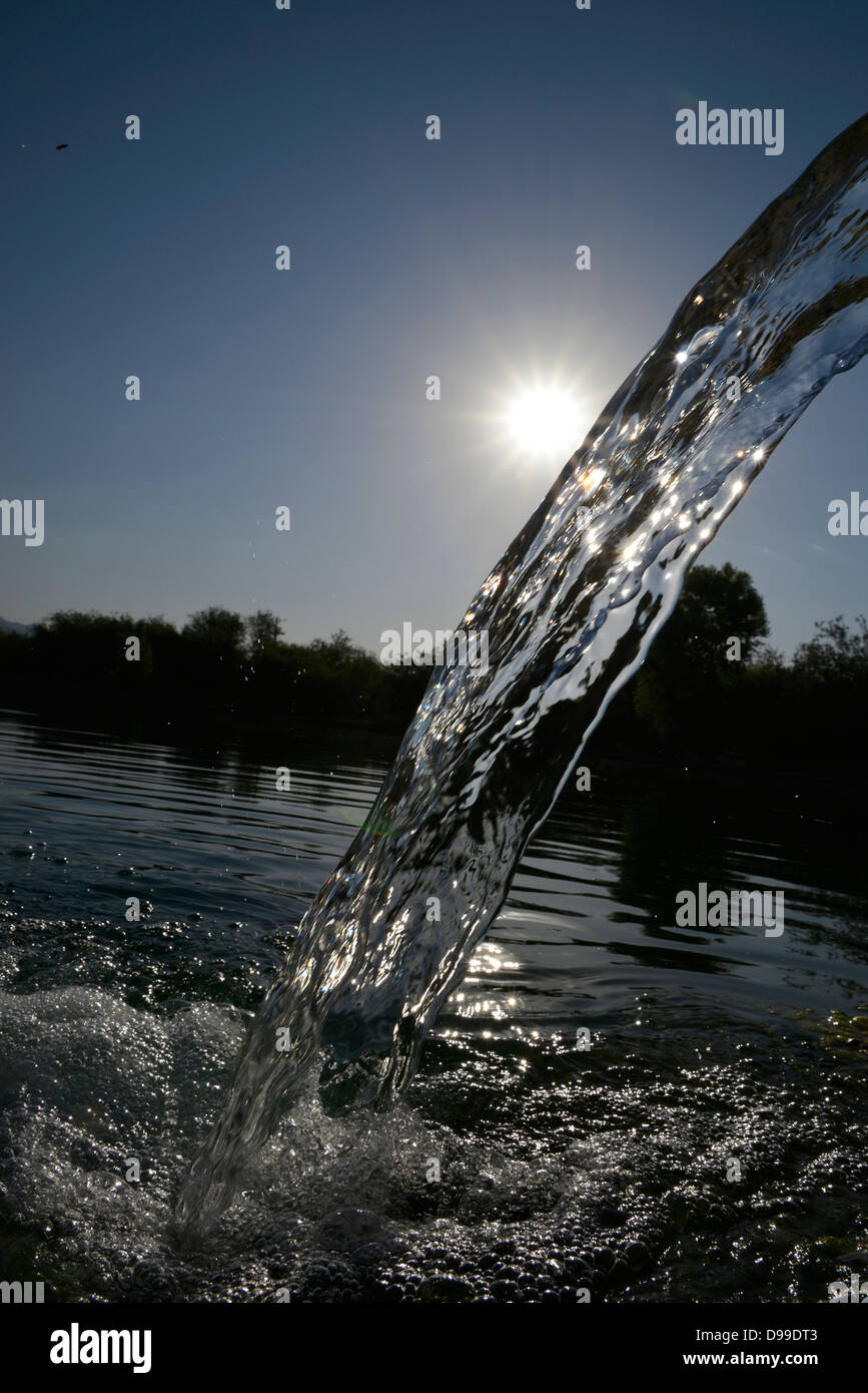 Well water is pumped in to a man made lake in the Sonoran Desert, Tucson, Arizona, USA. Stock Photo
