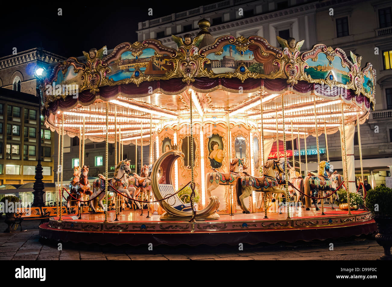 Carousel at night in Florence, Italy Stock Photo
