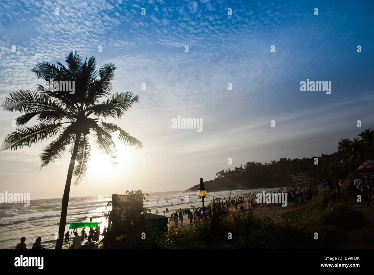 Tourists on the beach, Kovalam, Kerala, India Stock Photo