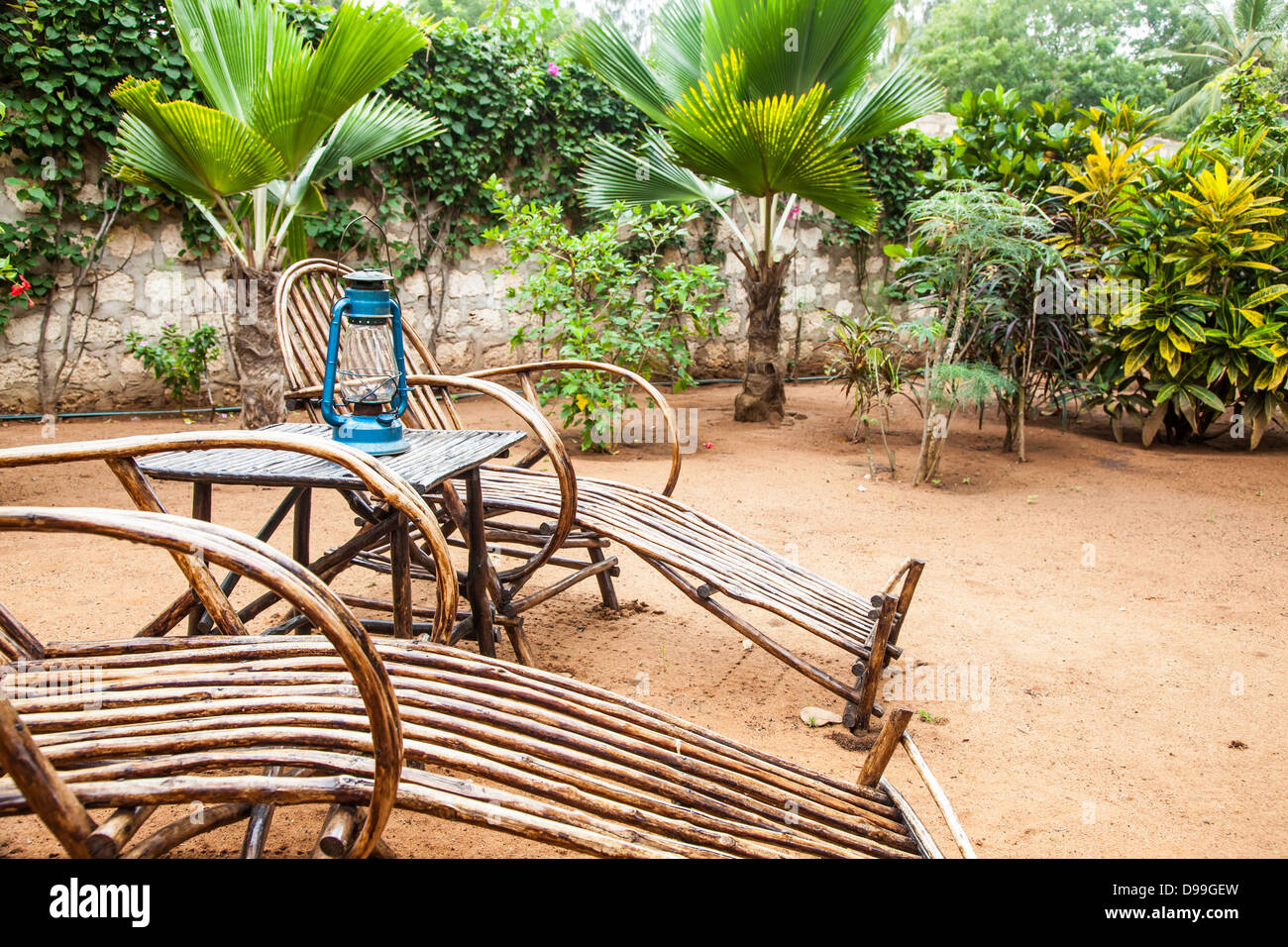 Kenya. Elegant furniture made of wood in an African garden Stock Photo