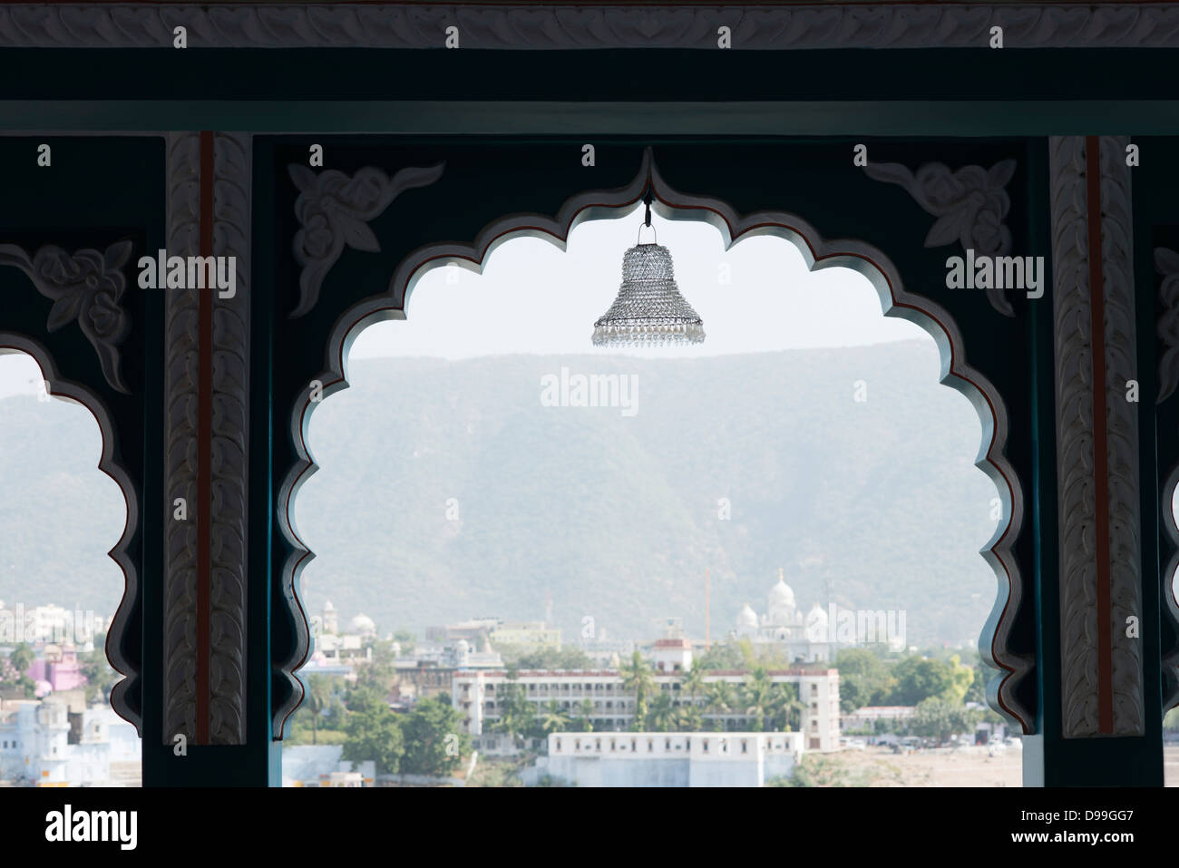 City viewed through the windows of a building, Pushkar, Ajmer, Rajasthan, India Stock Photo