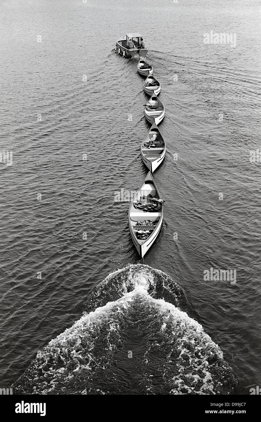 Canoes being collected after use on the Aussenalster in Hamburg. Stock Photo
