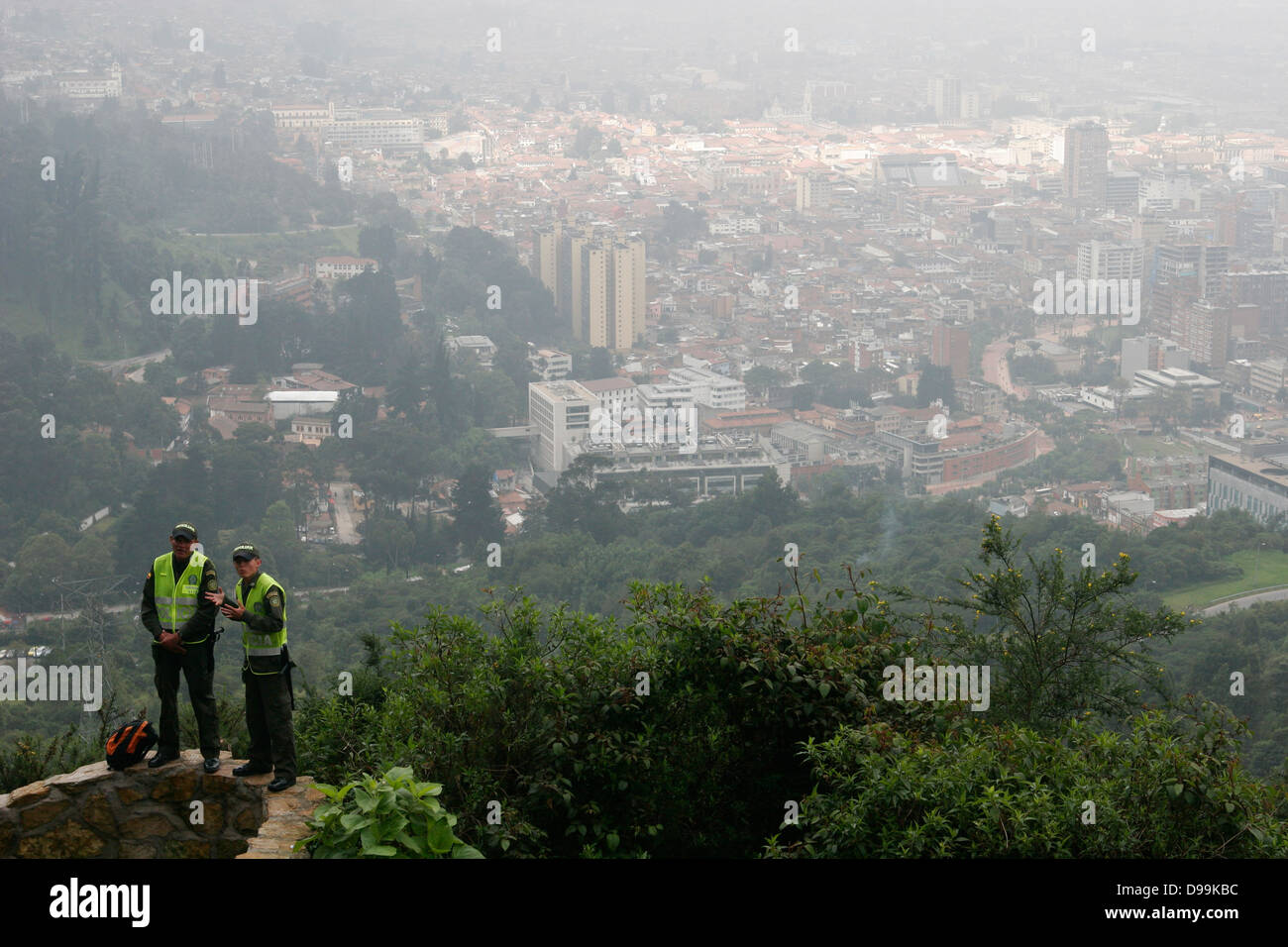Policemen at the viewpoint overlooking Bogota, Mt Monserrate Colombia, South America Stock Photo