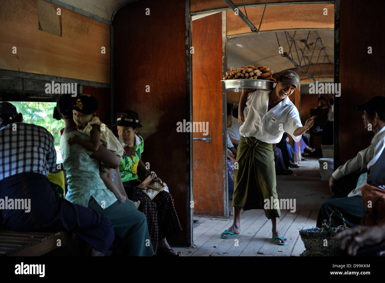 selling inside the Yangon train Stock Photo