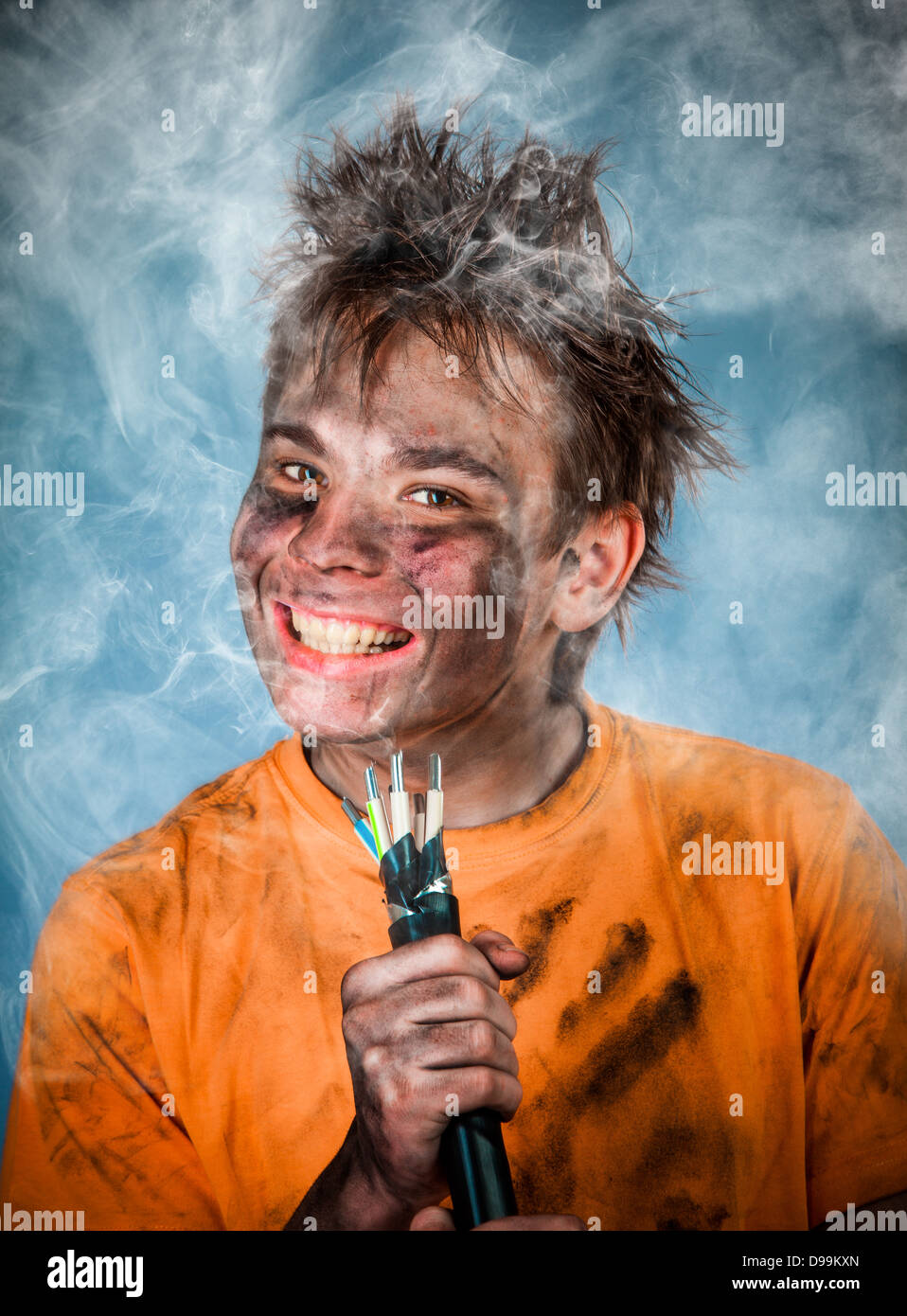 Boy has a electric shock Stock Photo