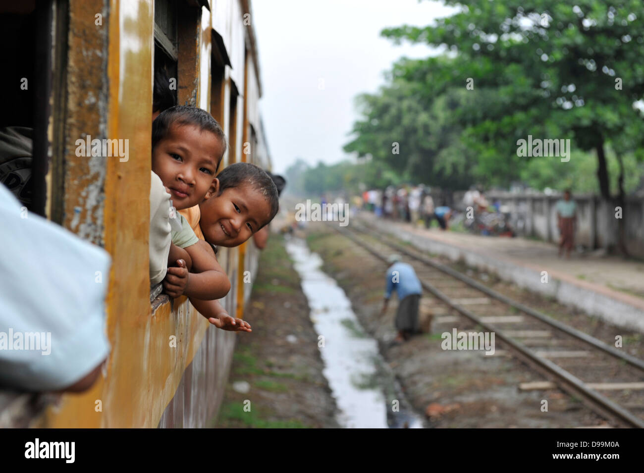 kids on a local train Stock Photo