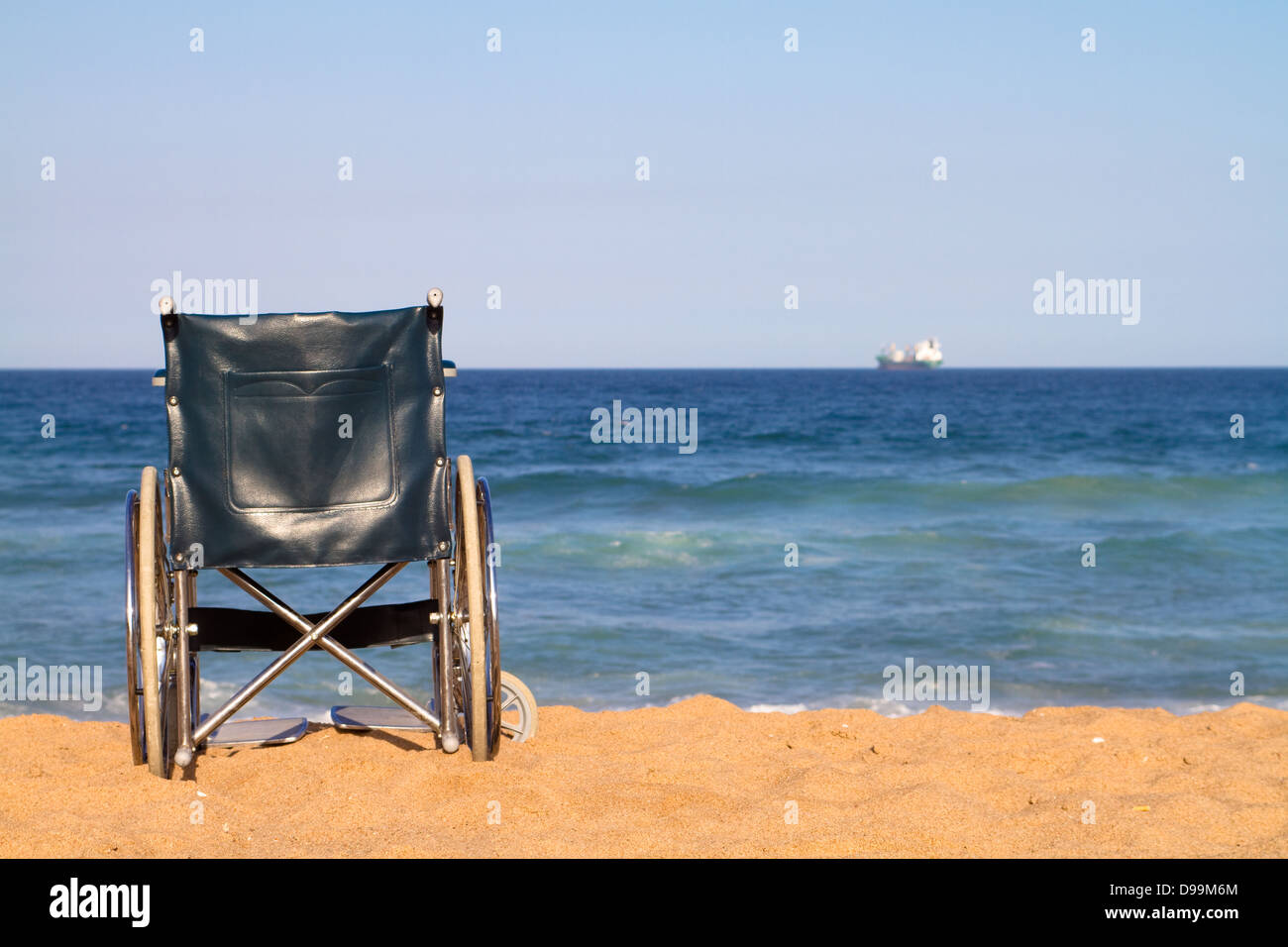 wheelchair on beach Stock Photo Alamy
