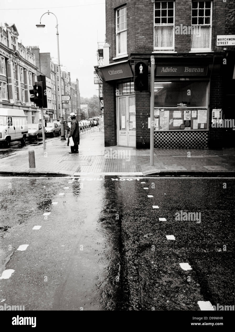 Wet street scene in Marchmont Street, near the Brunswick Centre, Russell Square Bloomsbury, London Stock Photo