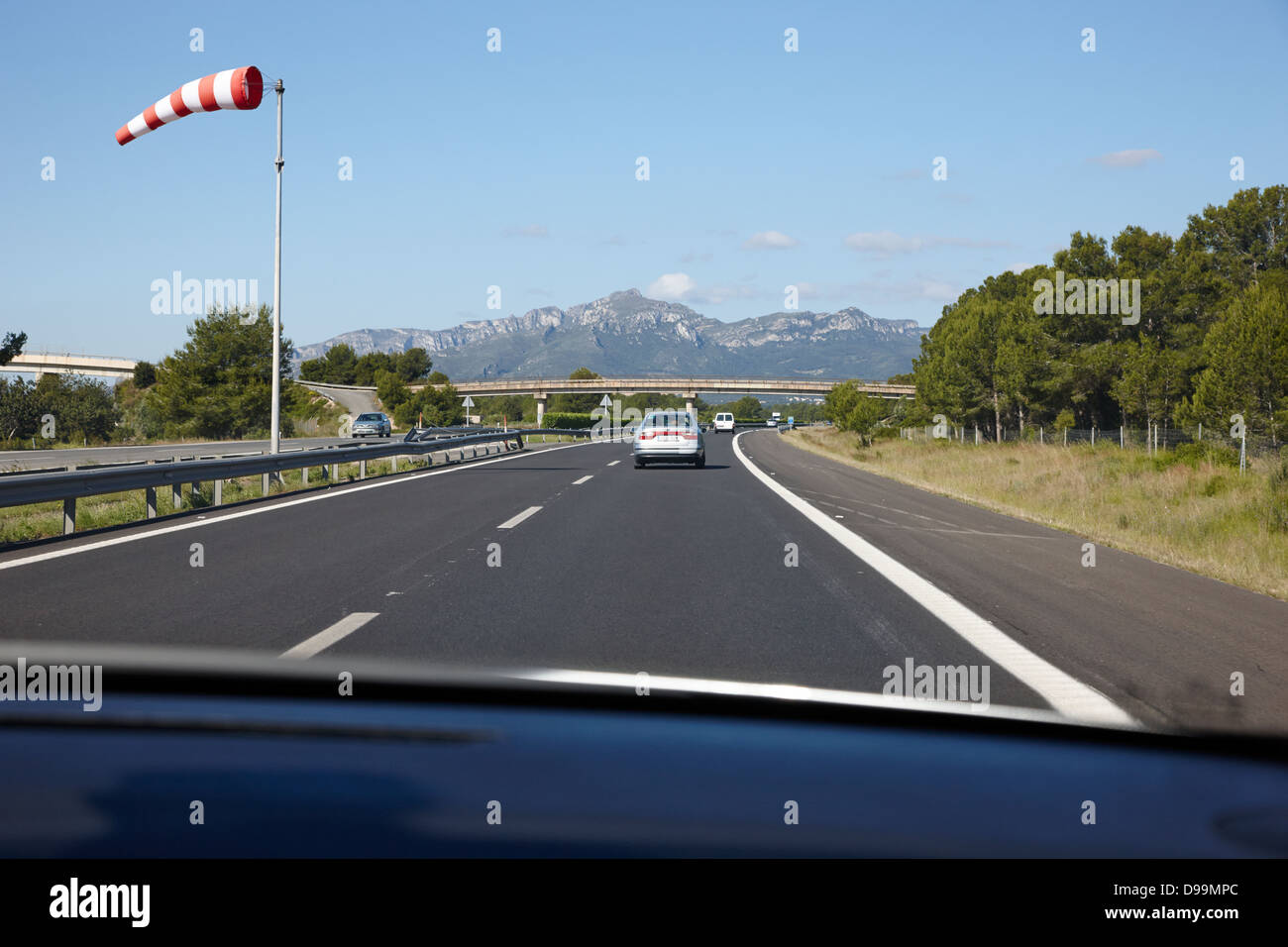 driving along ap-7 autopista del mediterraneo toll road barcelona to valencia spain in crosswinds Stock Photo