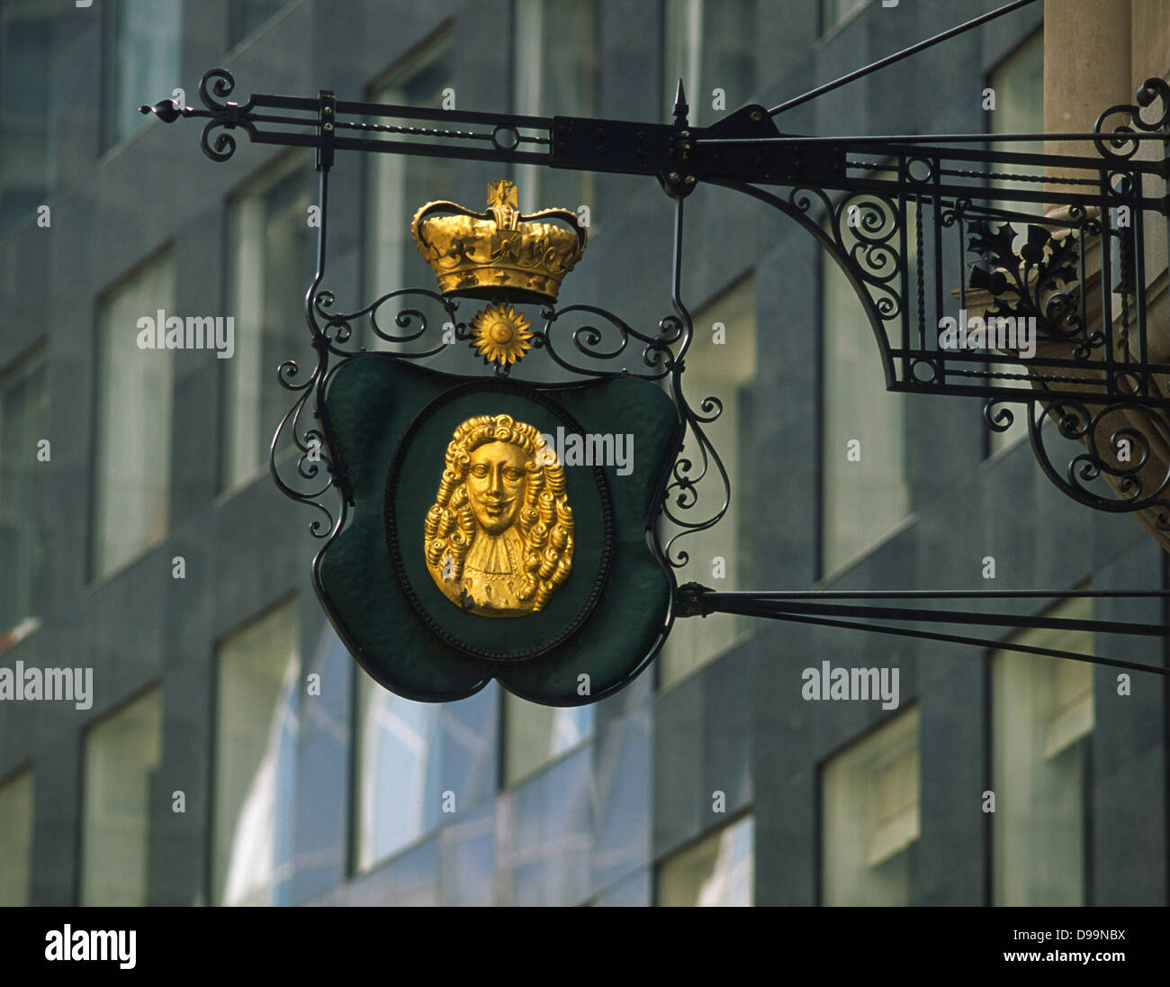 Lombard Street sign of King's head with sun in financial district, City