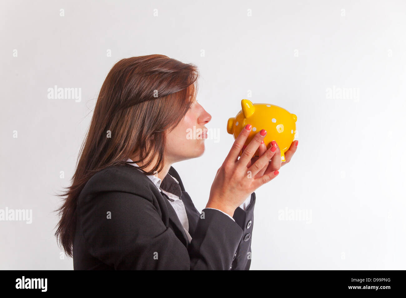 happy business woman with a piggy bank Stock Photo - Alamy