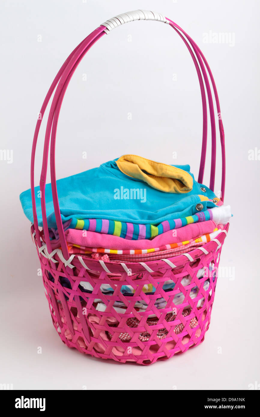 Clean laundry in a fancy basket. Concept of household chores Stock