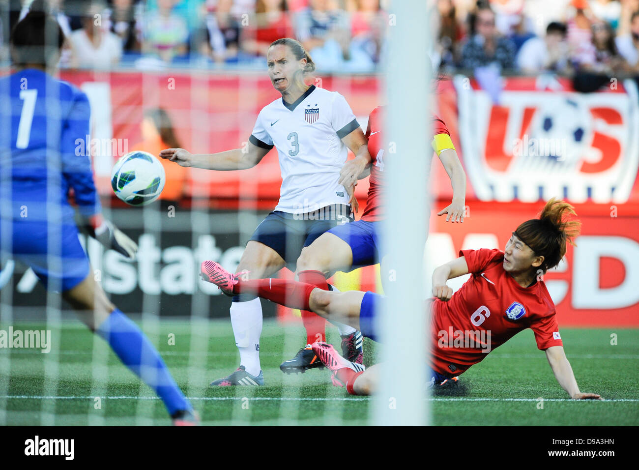 Foxborough, Massachusetts, USA. 15th June, 2013. Korea Republic defender Lim Seonjoo (6) makes a diving save and strips the ball from US Women's National defender Christie Rampone (3) during the International Friendly soccer match between the USA Women's National team and the Korea Republic Women's Team held at Gillette Stadium in Foxborough Massachusetts. Eric Canha/CSM Credit: csm/Alamy Live News Stock Photo
