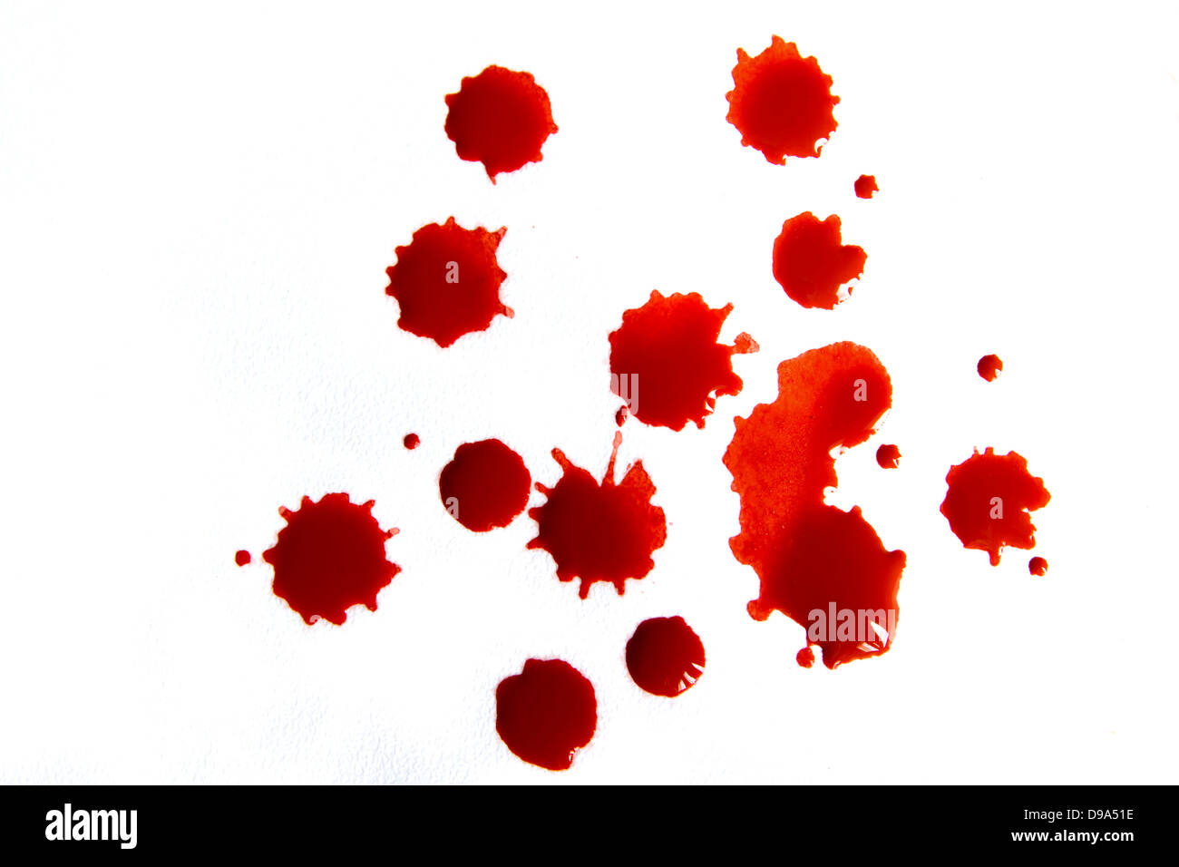 Blood droplets (stains, splatter) isolated on white background close up Stock Photo
