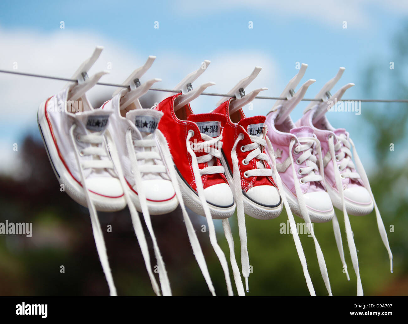 Converse Pumps Trainers on a Washing LIne Stock Photo