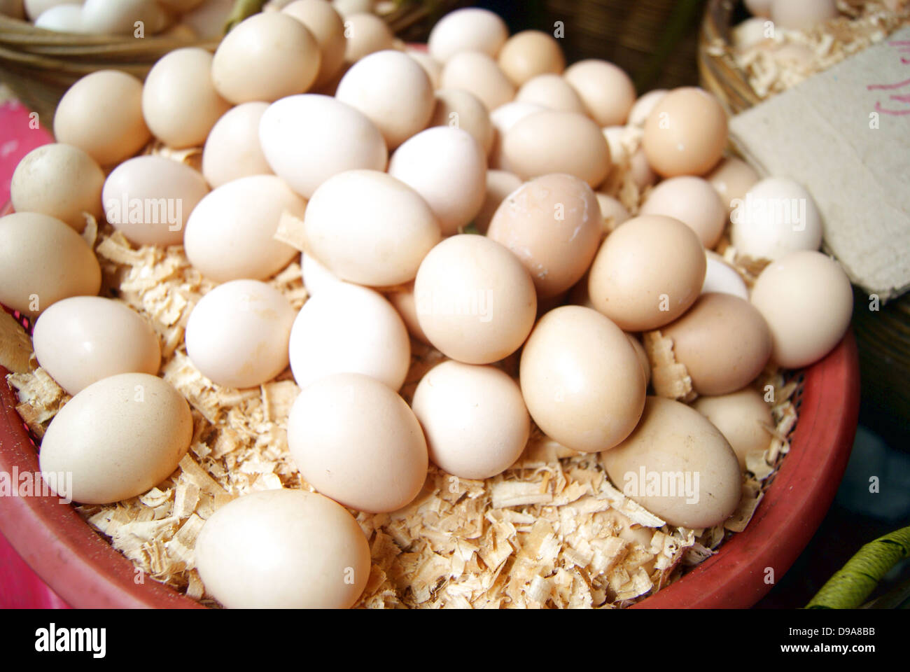 A pile of eggs, at a farmers' market. Stock Photo