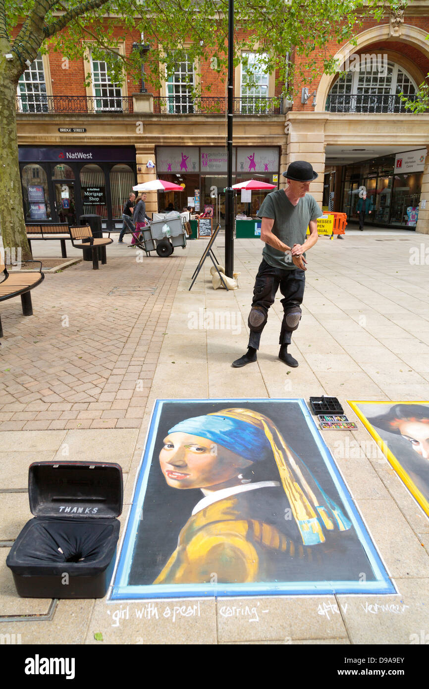Street artist version of Johannes Vermeer's Girl with a Pearl Earring, Peterborough, England Stock Photo