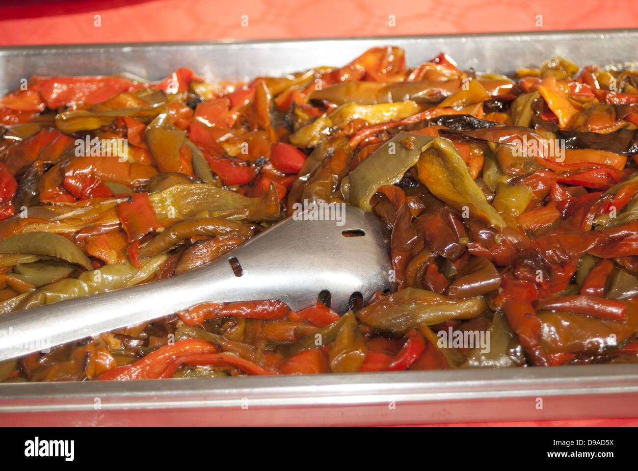 a tray of red peppers Stock Photo