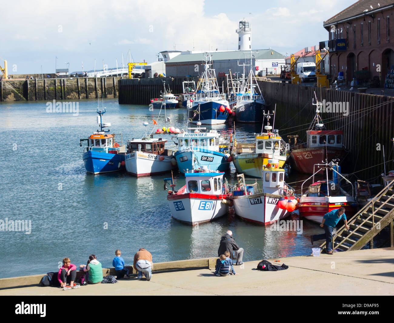 Fishing boats tied alongside the Fish Quay in Scarborough Harbour with