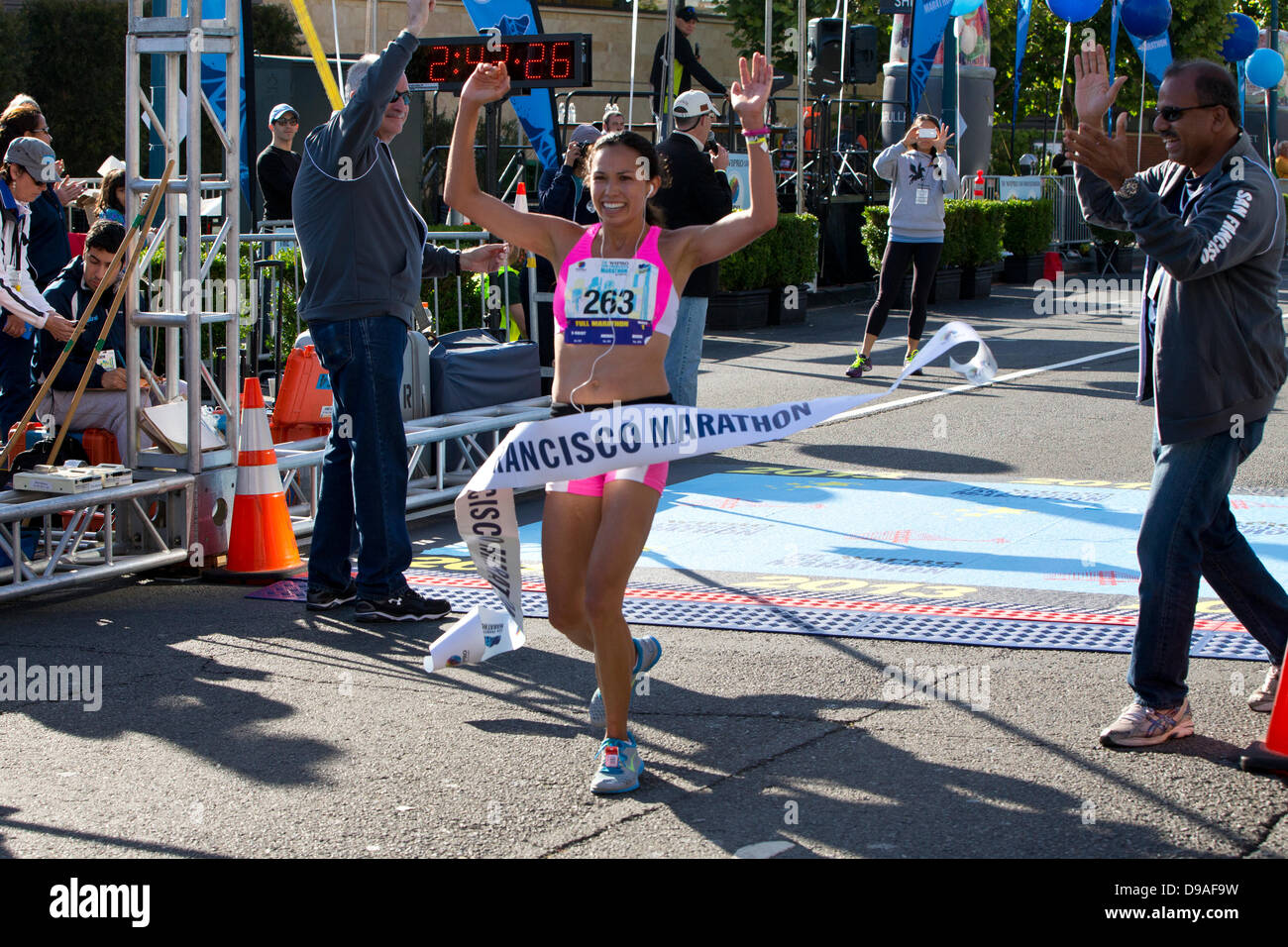 San Francisco, USA. 16th June, 2013. Anna Bretan celebrates while crossing the finish line in first place during the 2013 San Francisco Marathon in San Francisco, California, United States of America on June 16, 2013. Credit:  Jason O. Watson/Alamy Live News Stock Photo