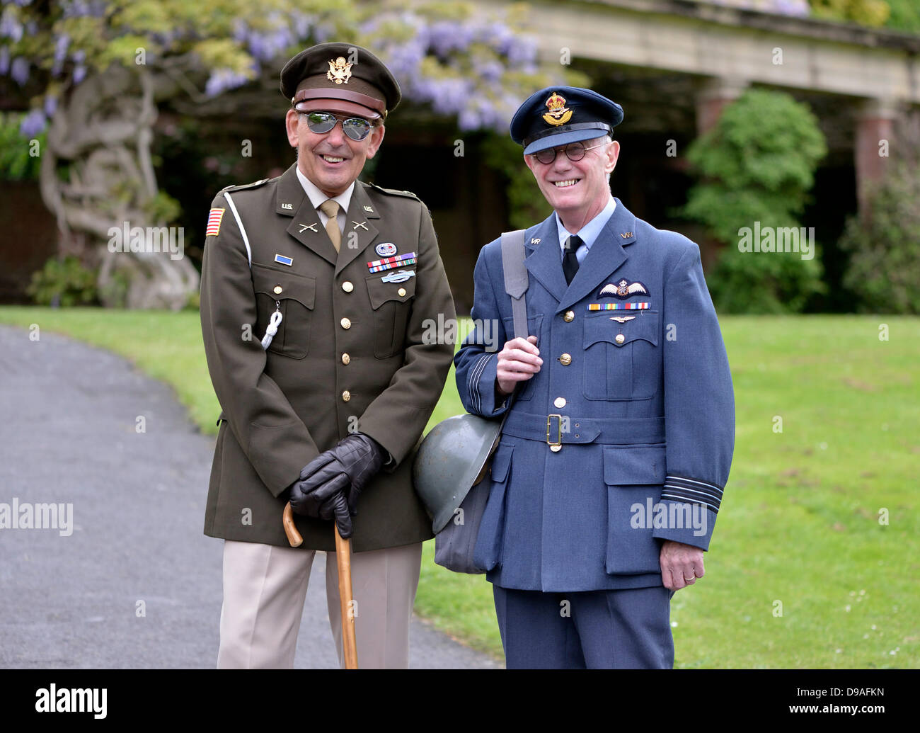 Harrogate, Yorkshire, UK. 16th June, 2013.   A man in a USA major's uniform and another dressed as a  a RAF Flight Lieutenant pose at an event in Valley Gardens to raise money for The Magnesia Well Pump Room Project to create an exhibition on mineral springs. Credit:  John Fryer/Alamy Live News Stock Photo
