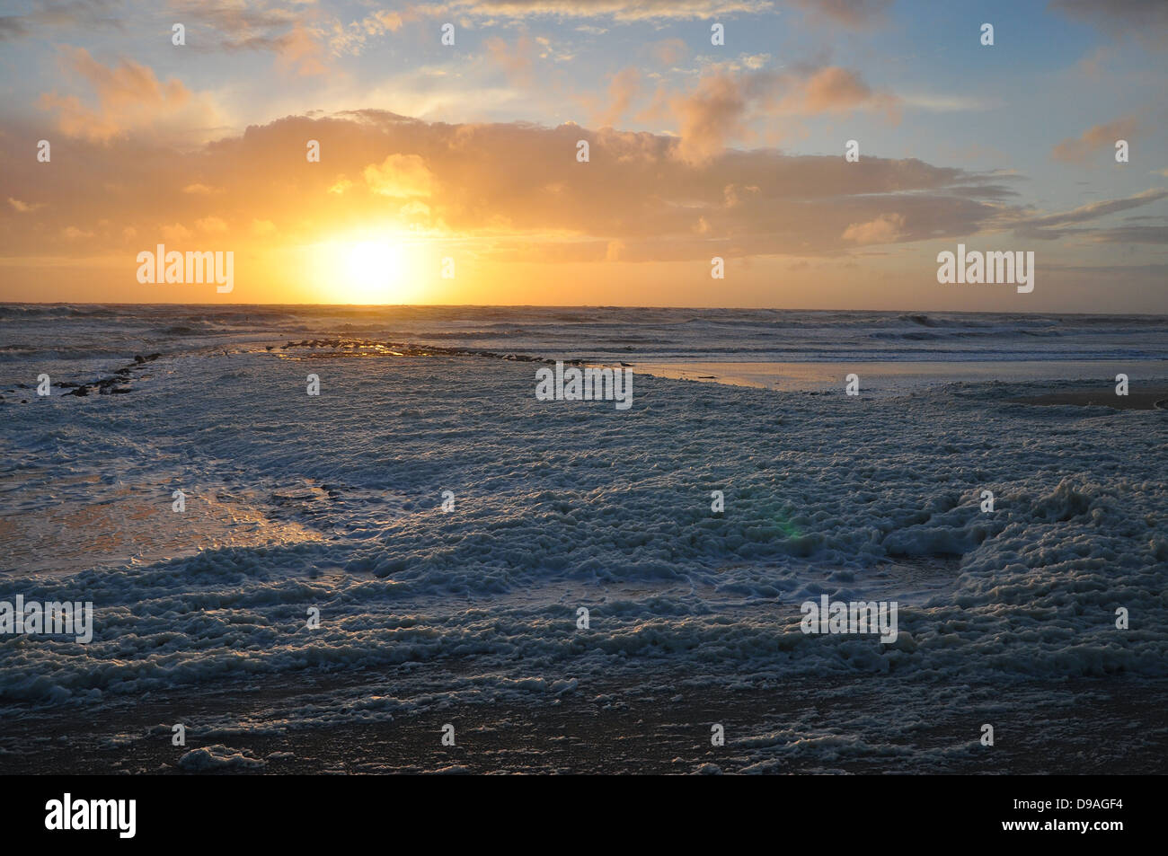 golden sunset above stormy sea Stock Photo - Alamy