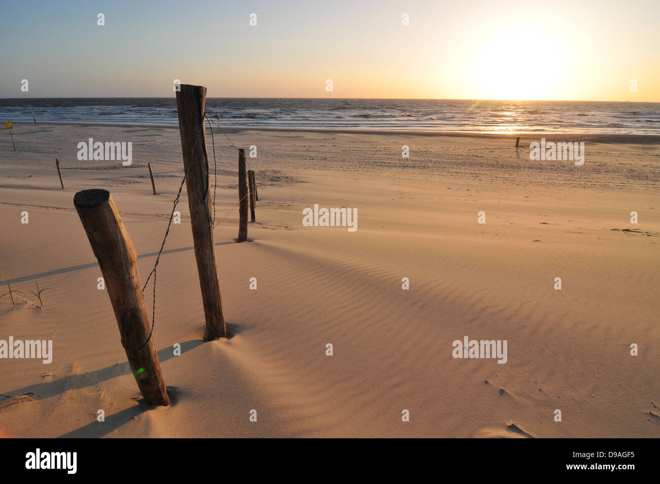sunset and fence Stock Photo - Alamy
