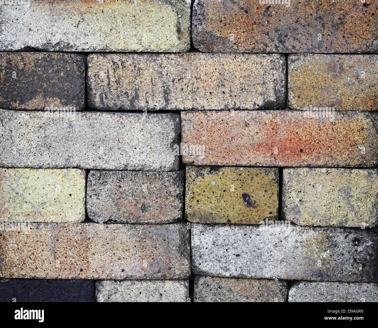 Fireproof bricks stacked like wall - background Stock Photo - Alamy