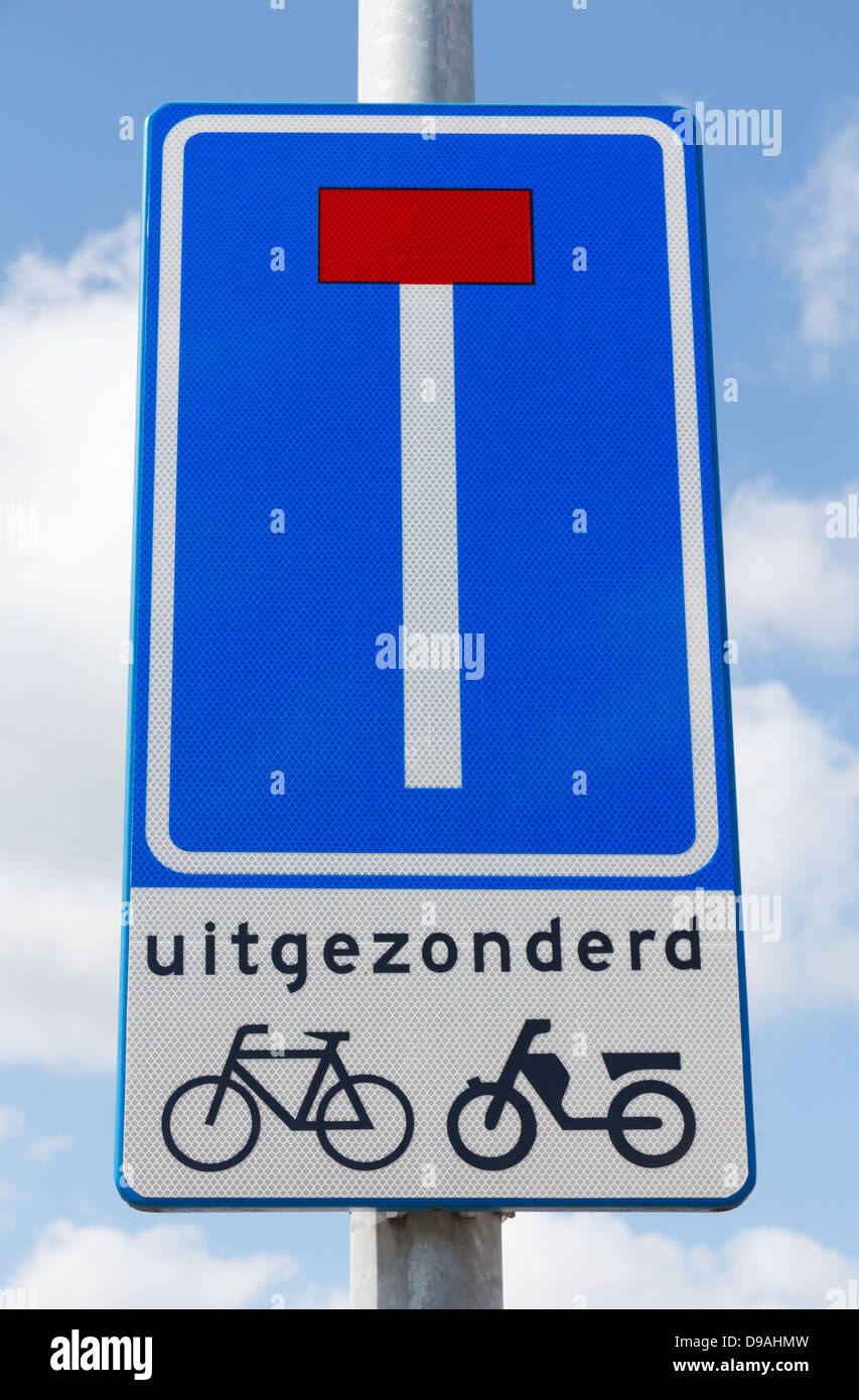 Road sign in the Netherlands indicating dead end except for cyclists and mopeds Stock Photo