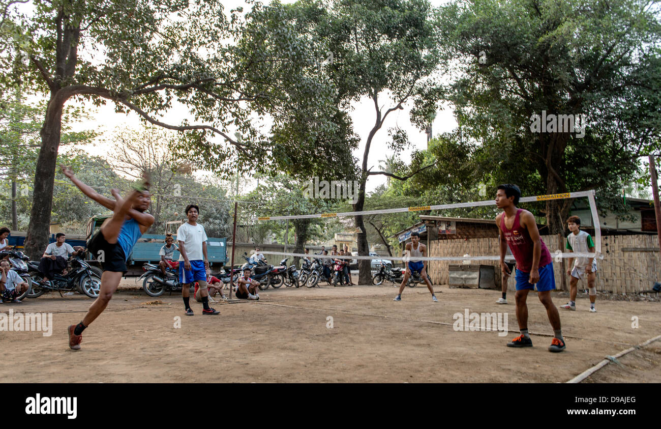 Burmese boys playing Chinlone national sport Mandalay Myanmar Burma