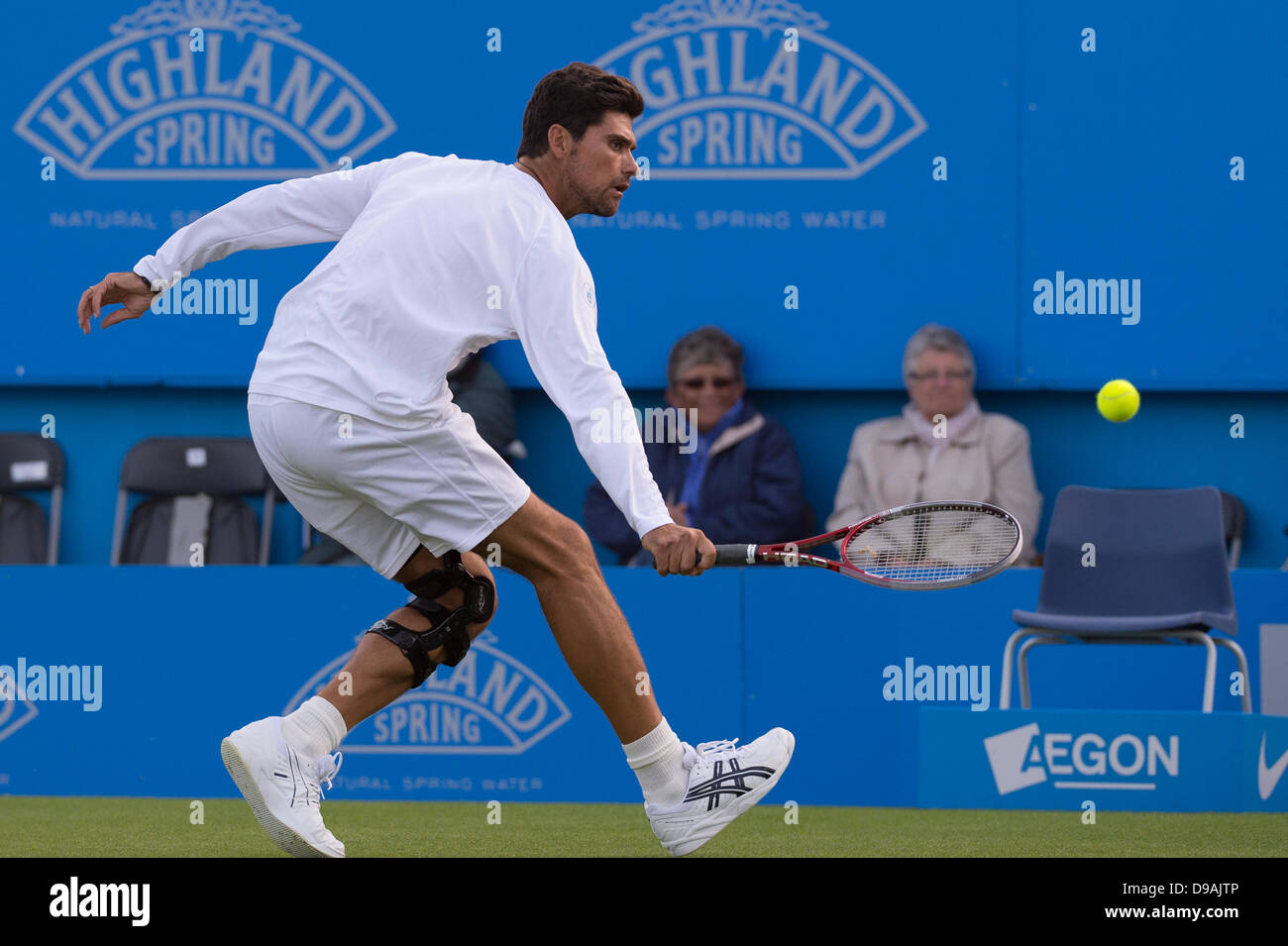 Eastbourne, UK. 16th June, 2013. Aegon International 2013 Tennis Eastbourne UK - Sunday. Legends Match. Mark Philippoussis (AUS) returns with a single handed backhand in his exhibition doubles match partnering Rennae Stubbs (AUS) against Greg Rusedski (GBR) and Lindsay Davenport (USA) on centre court. Rusedski and Davenport won the match 5-2. Credit:  Mike French/Alamy Live News Stock Photo