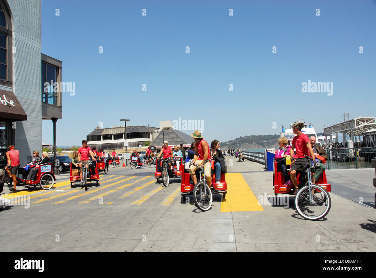 Pedicab rides on the Embarcadero in San Francisco, California Stock Photo
